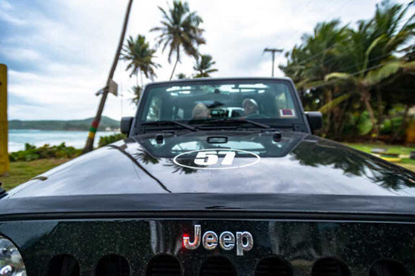 Jeep convoy on Grenada coastal road