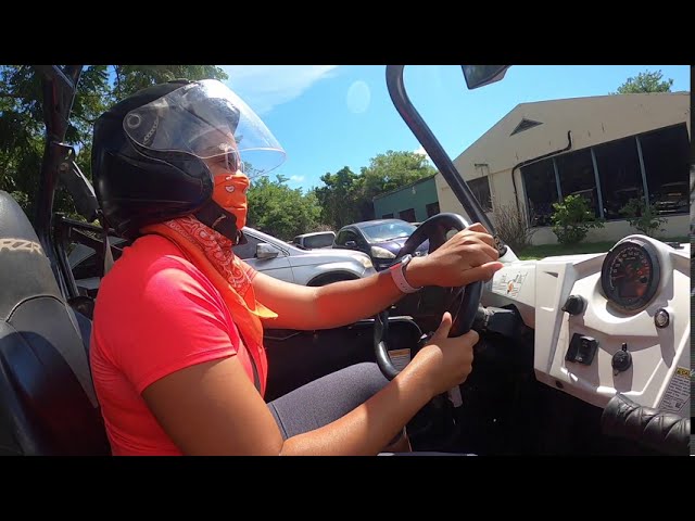 Rider in RZR off-road buggy